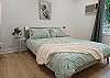 Bedroom two with comfortable queen bed