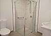 Studio bathroom with shower and toilet