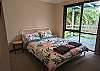 Bedroom two with comfortable queen bed