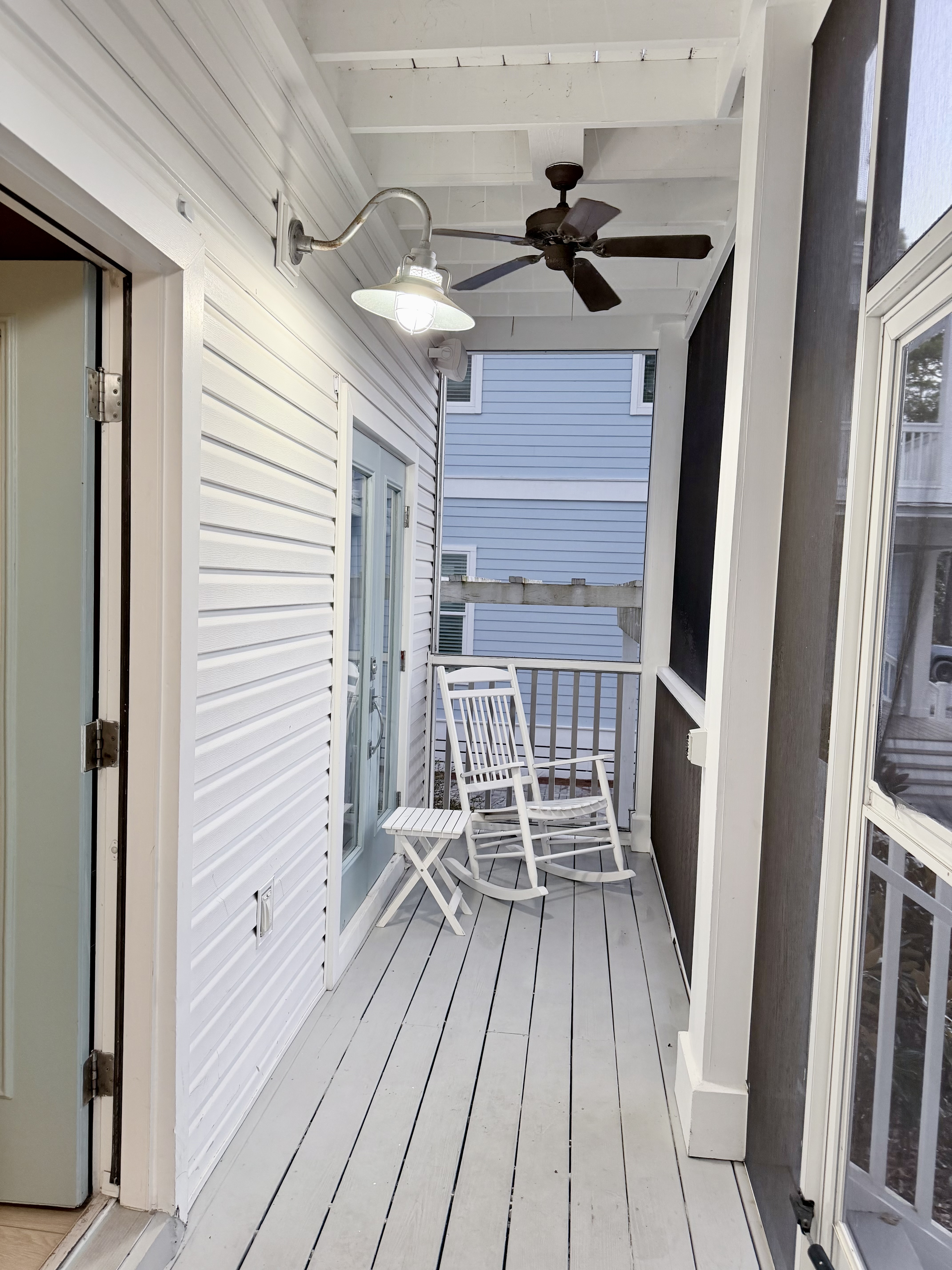 Rocking Chairs on second level screened in porch