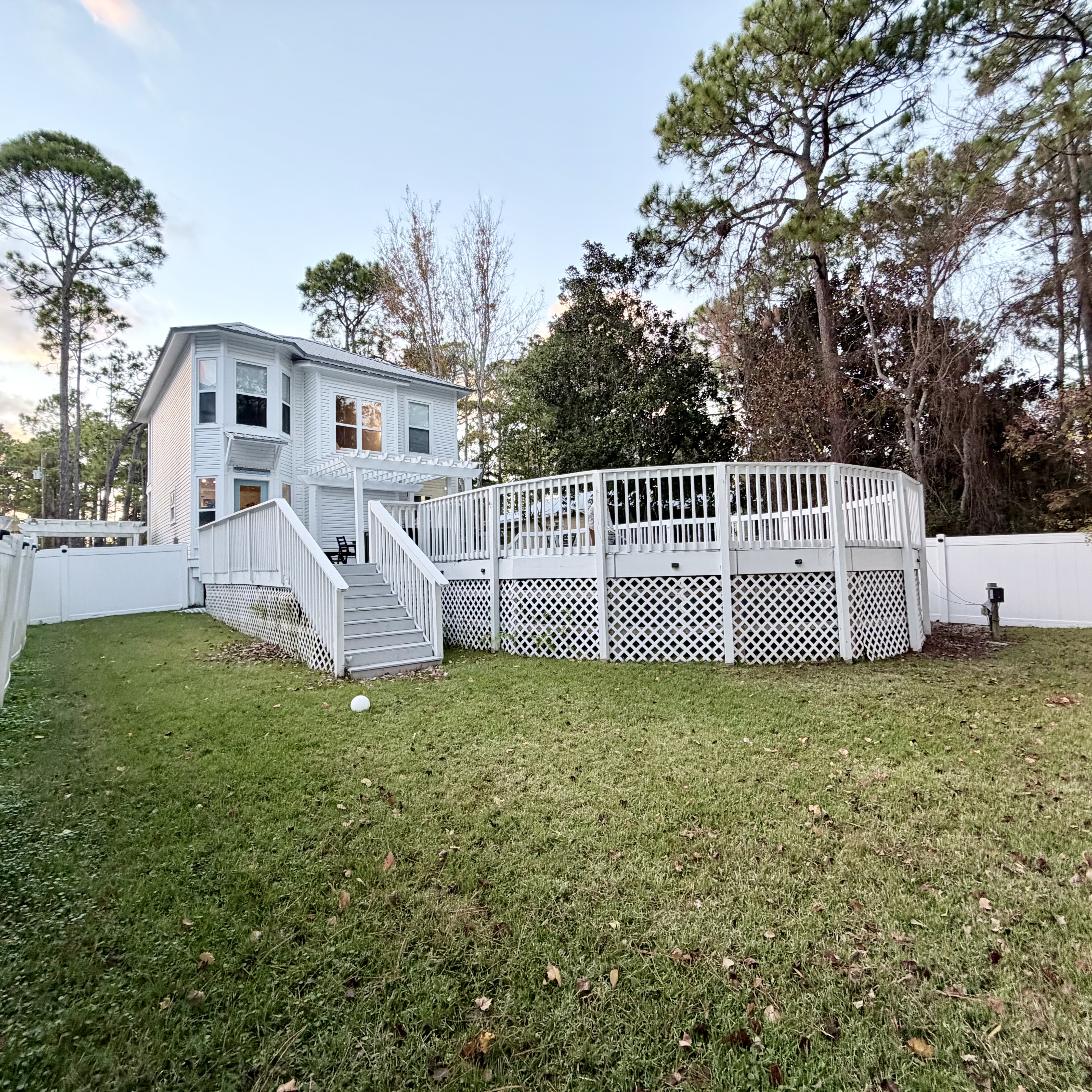 Fenced in back yard with pool